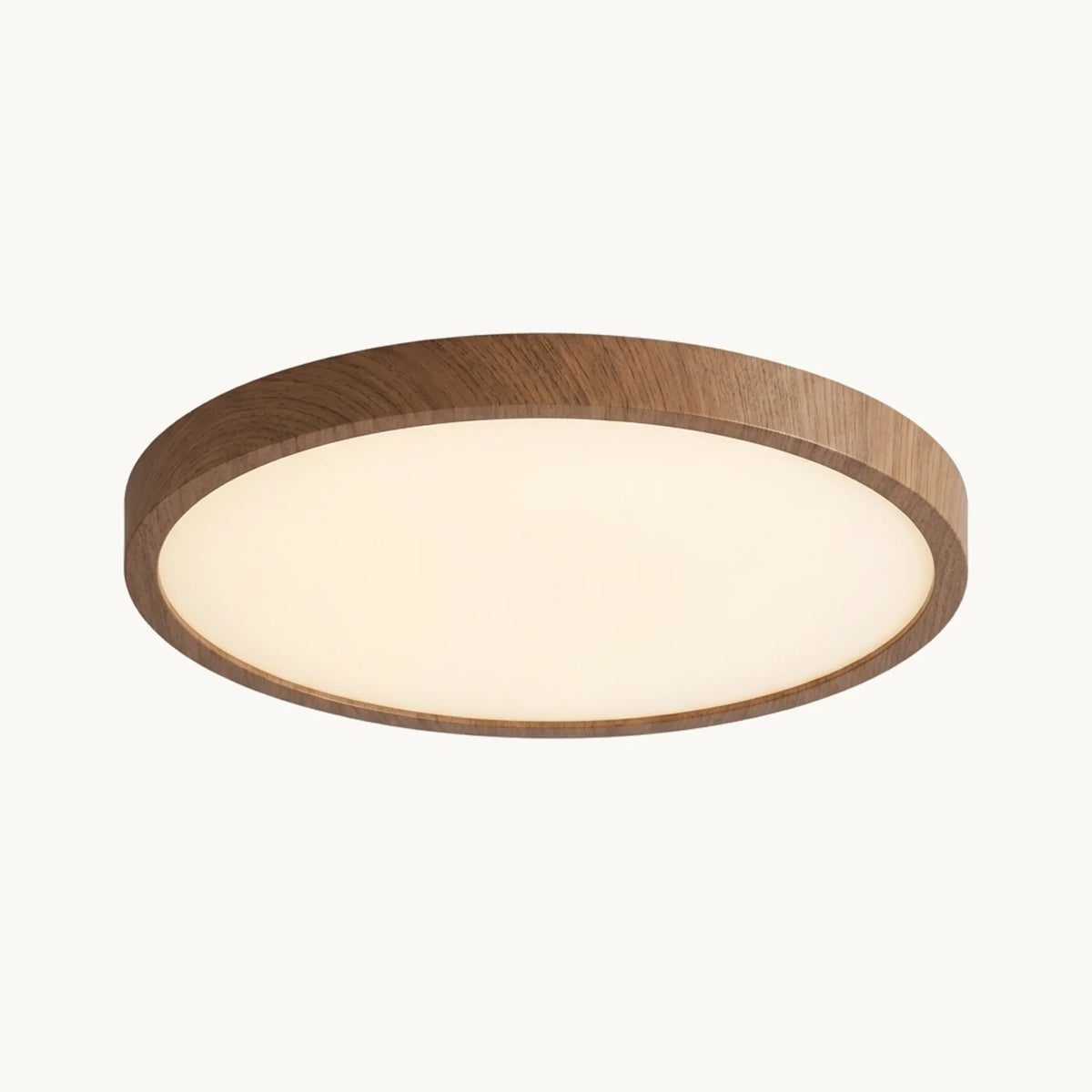 Plafonnier vu de dessous : diffuseur blanc opalin cerclé d'un contour effet noyer