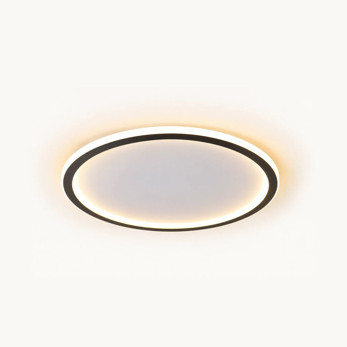 Plafonnier extra plat LED, jonc d'aluminium noir cerclant un diffuseur de silicone, allumé
