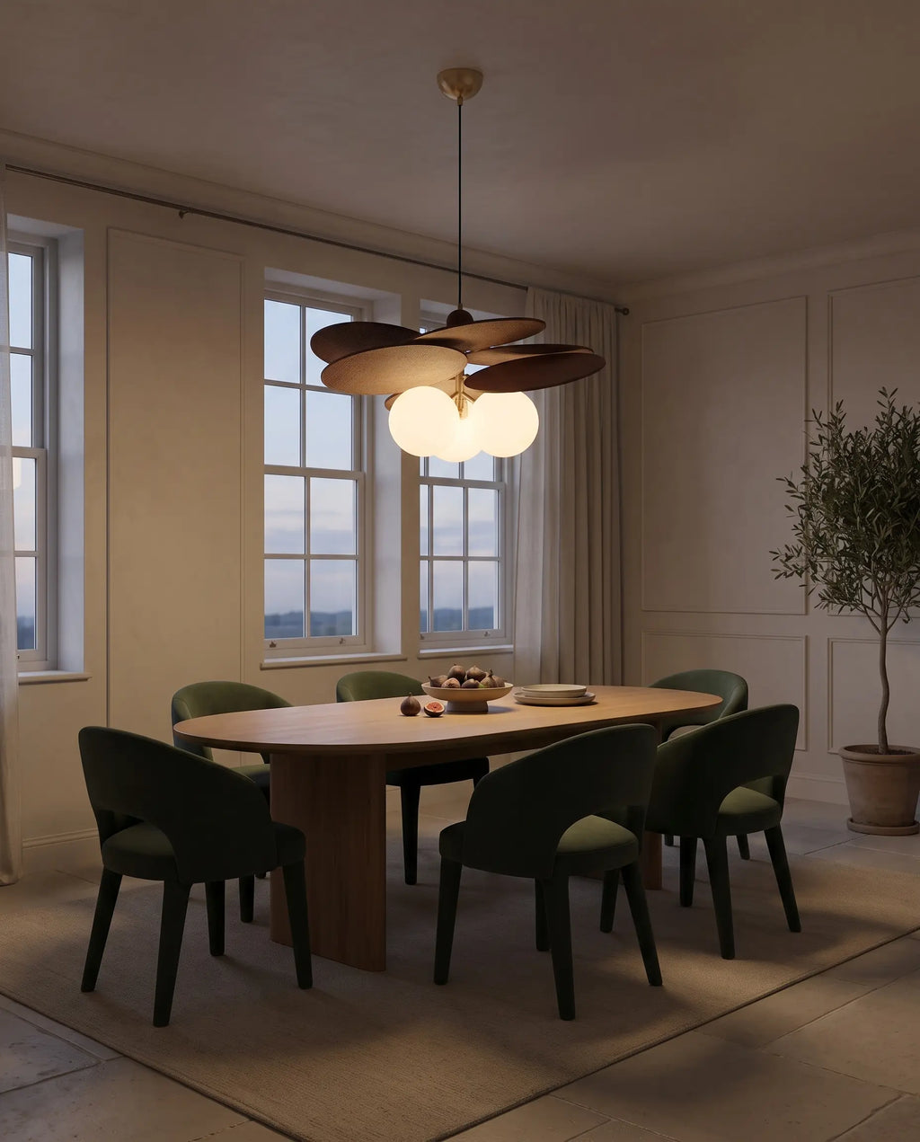 Suspension raphia trois globes Bagatelle au-dessus d'une table de salle à manger